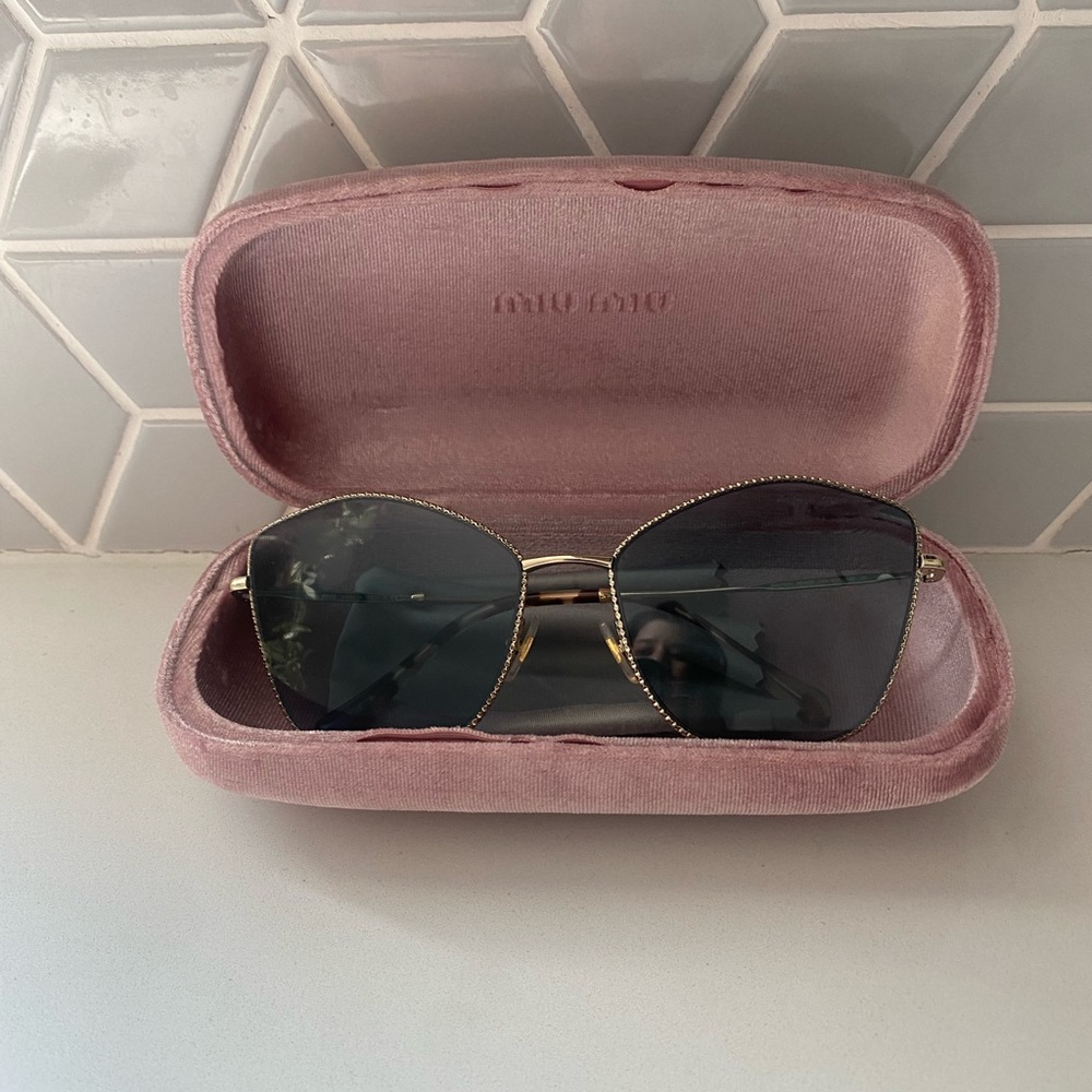 Miu Miu silver rim sunglasses